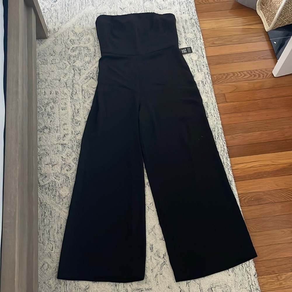 NWT EXPRESS black strapless wide leg jumpsuit. Size 12 but runs small (8/10 fit)